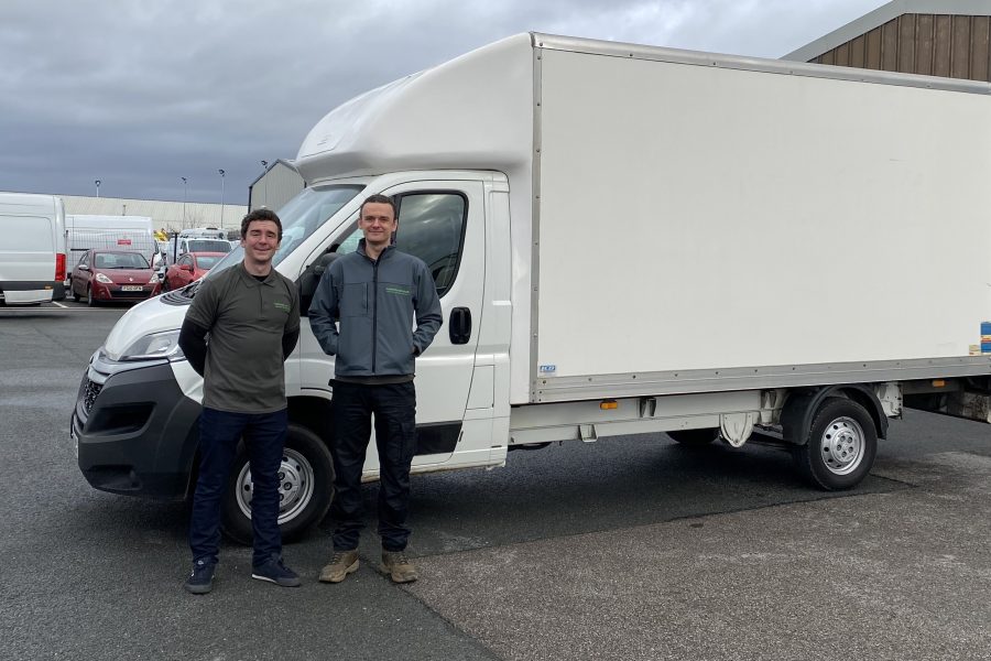 Team stood outside of van image 2