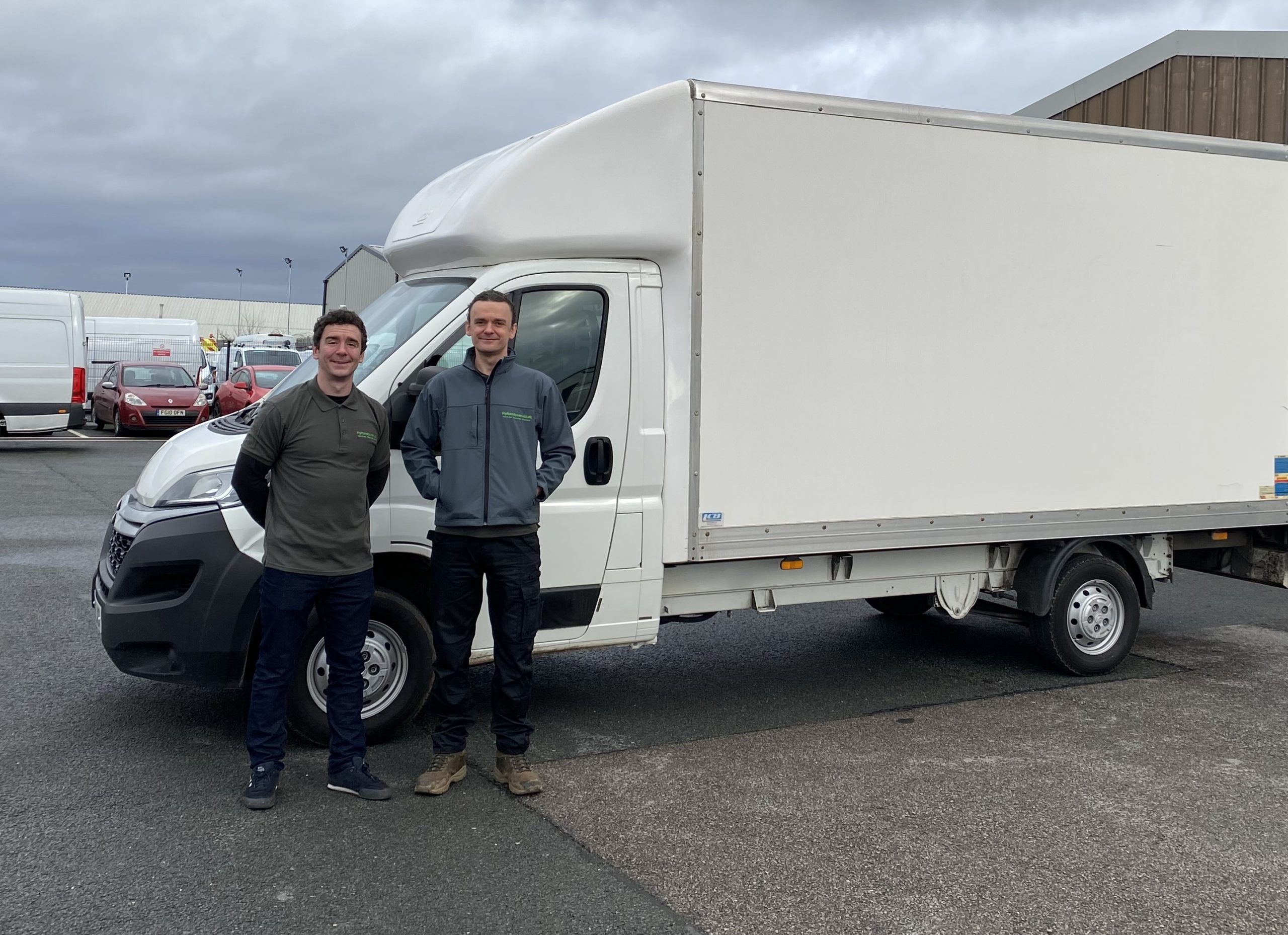 Team stood outside of van image 2