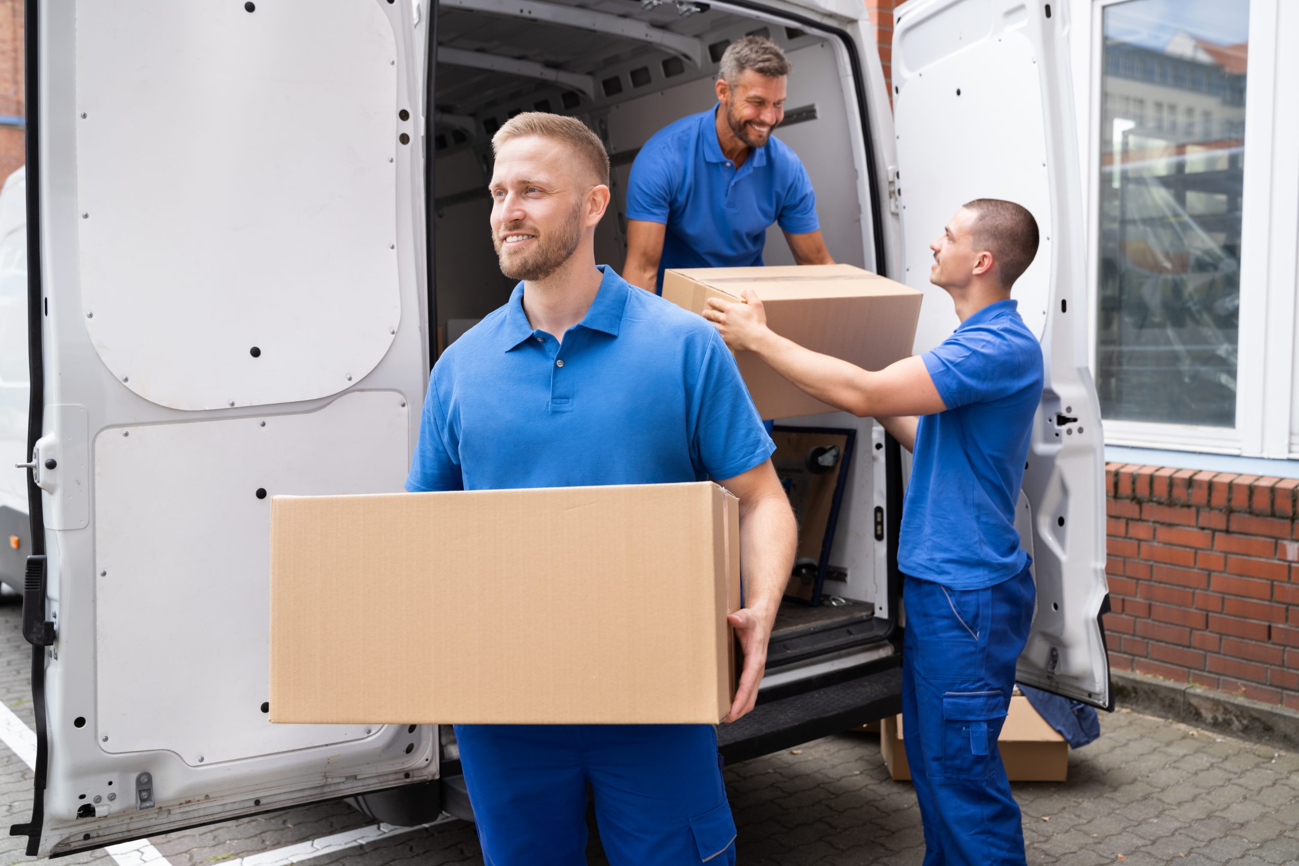 Truck Movers Loading Van Carrying Boxes